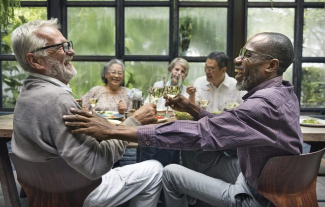 A group of individuals celebrating their new hearing aid lifestyle in Michigan. 